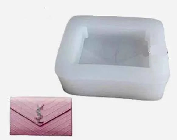 Borsetta Yves Saint Laurent Griffe. Moda YSL Stampo in silicone anche per Candele