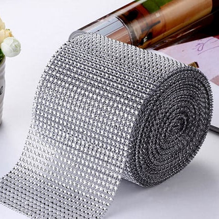 Silver. 10cm high rhinestone border with 24 rows.