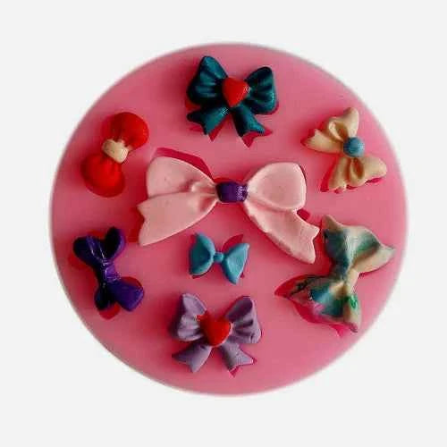 Fiocchi e Papillon. Stampo in Silicone con 7 Fiocchi