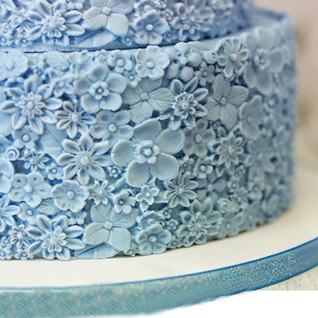 Flowers. Large 37 x 12 cm silicone floral border mold with many flowers.